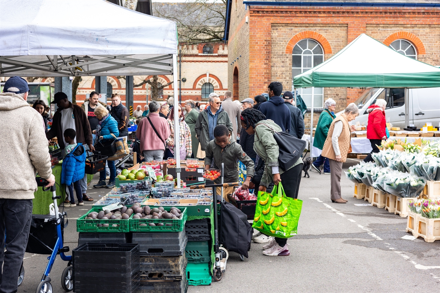 Shoppers browsing the market stalls at Fairfield, Dorchester.