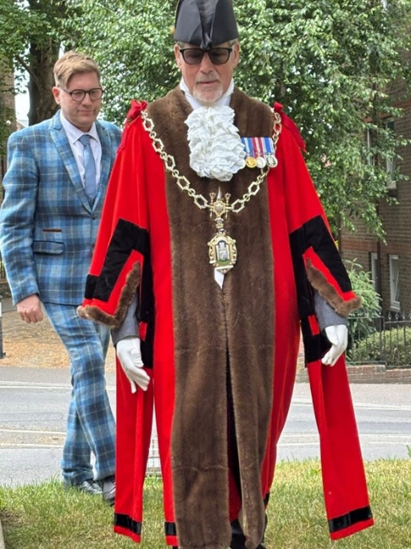 Mayor Les Fry in the Mayoral robes and civic chain attending a wreath laying during the Thomas Hardy Victorian Fair
